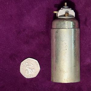Bomblet from a Rheinmetal 155 MM Carrier shell-shaped charge.