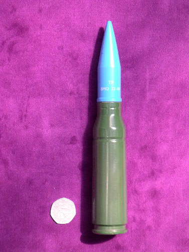 25 MM Practice Bushmaster system round.