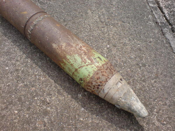 the complete head with fuze, empty`d by bomb disposal but not sure of gun firing it ?